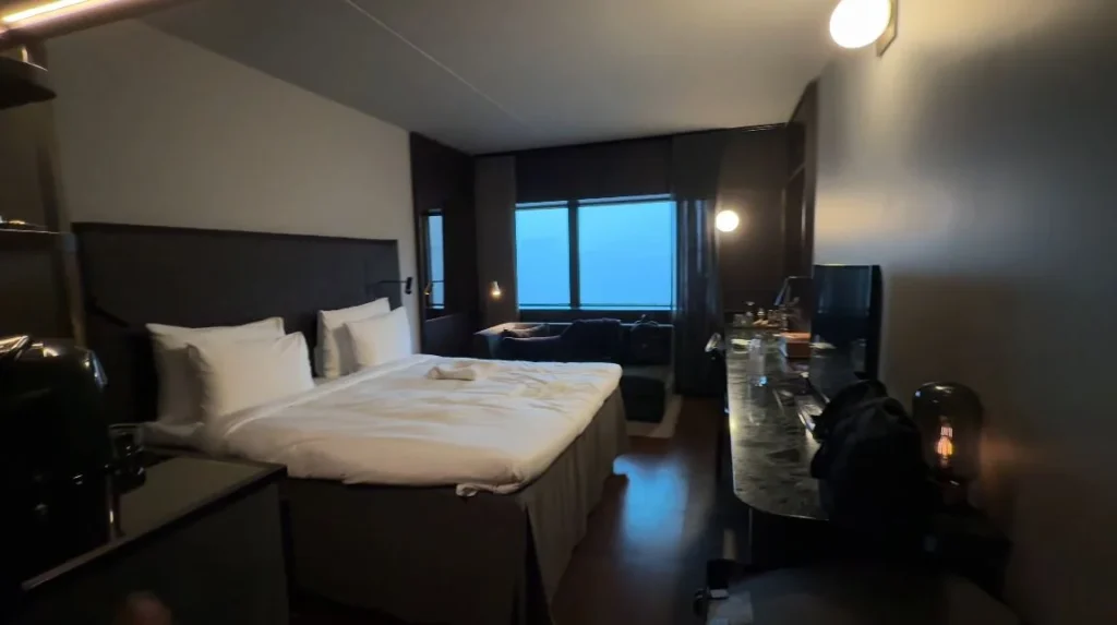 dark hotel room with modern amenities