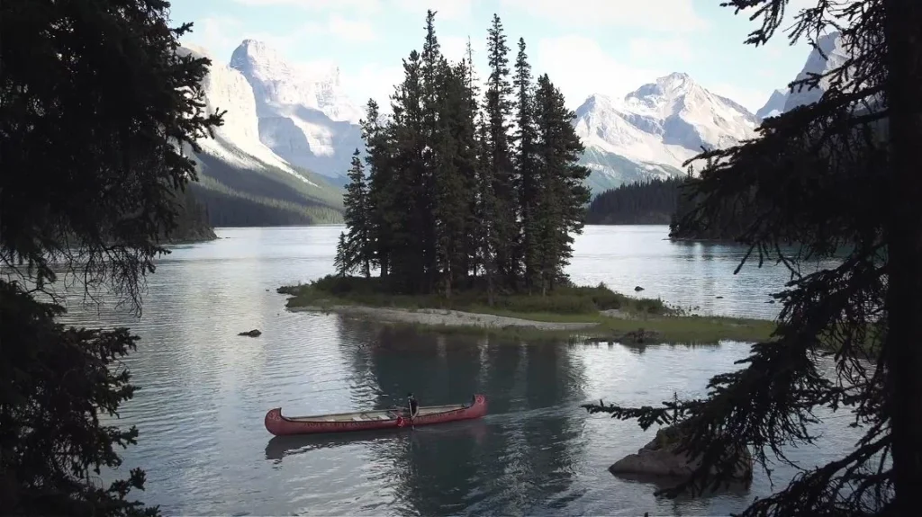 Spirit Island on Maligne Lake with canoe