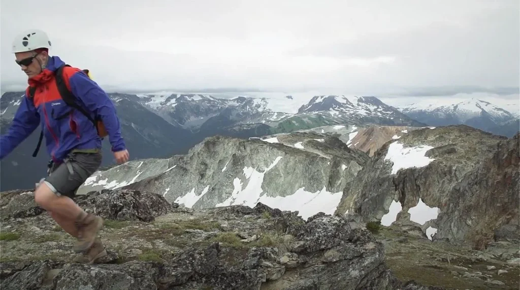 hiker on rocky mountain ridge