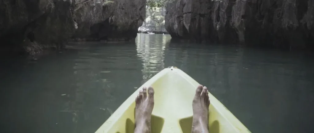 Kayaking through limestone caves