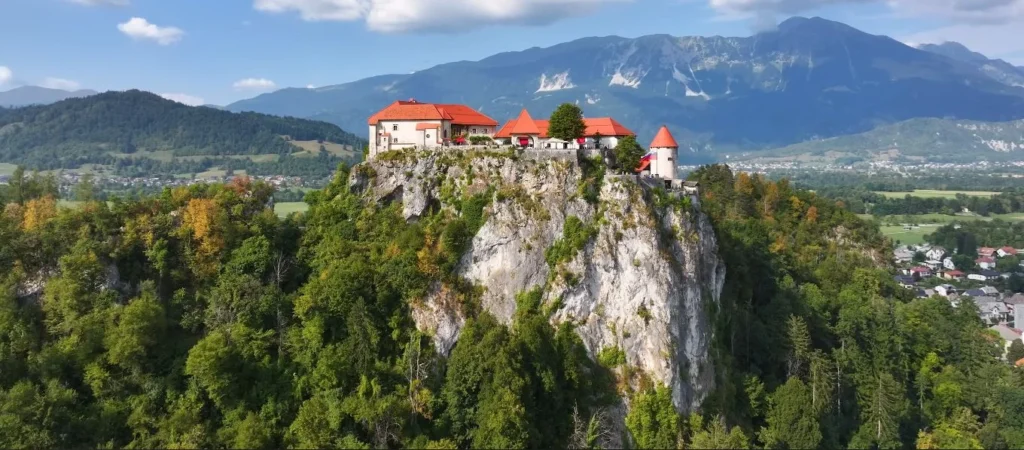 Bled Castle on cliff, aerial