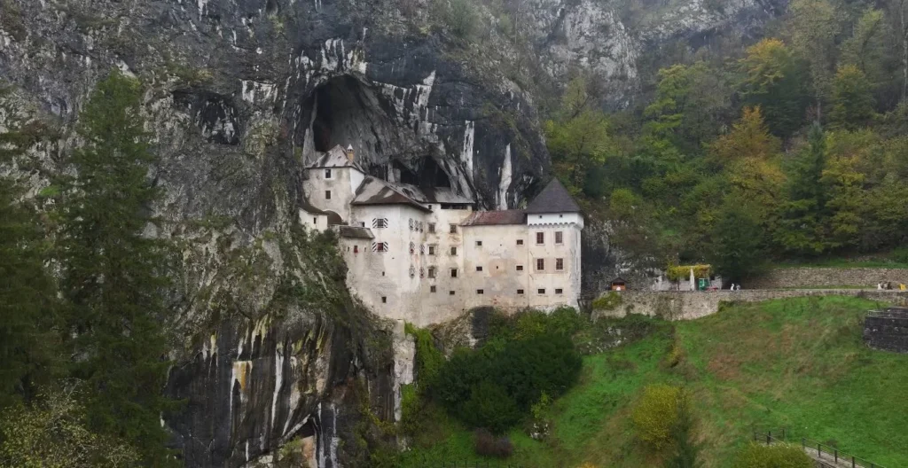 Predjama Castle wide shot, built into cliff