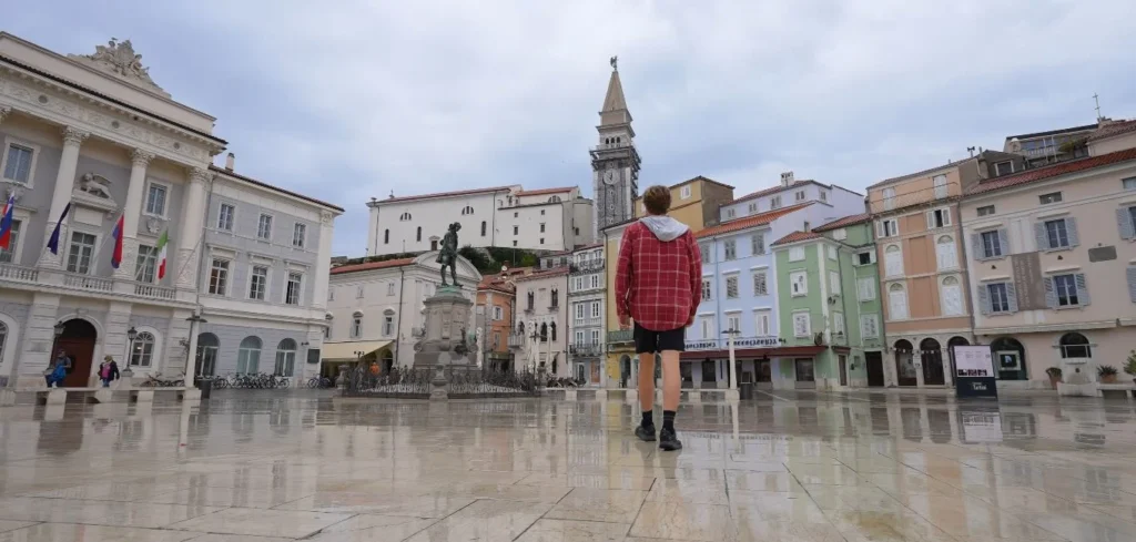 Tartini Square, wet marble, kid standing alone