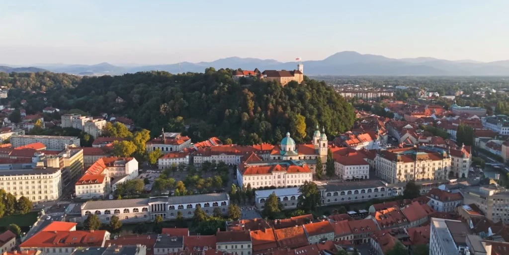 Triple Bridge street level, Franciscan Church pink facade (1)